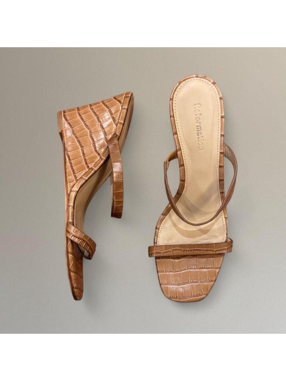 Reformation snake skin sandal wedges.